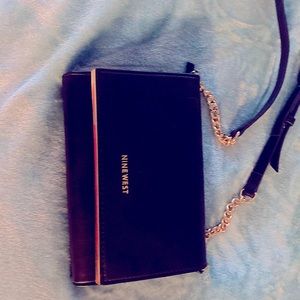Cross body bag with gold accents